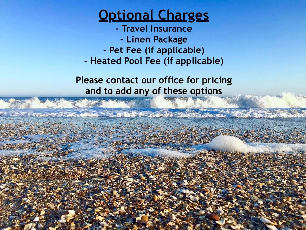 A tranquil stretch of North Topsail Beach with gentle ocean waves rolling onto the sandy shore, dotted with seashells. The golden sunset casts a romantic glow across the beach, inviting leisurely strolls and quiet moments together.